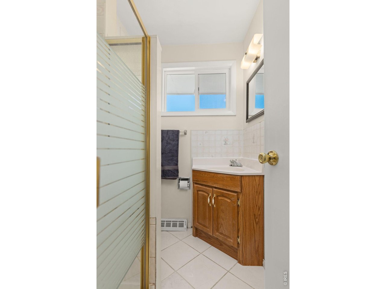 218 Bothun Road Berthoud, CO 80513 - Photo 15 of 35 3/4 Bathroom off Kitchen and Laundry