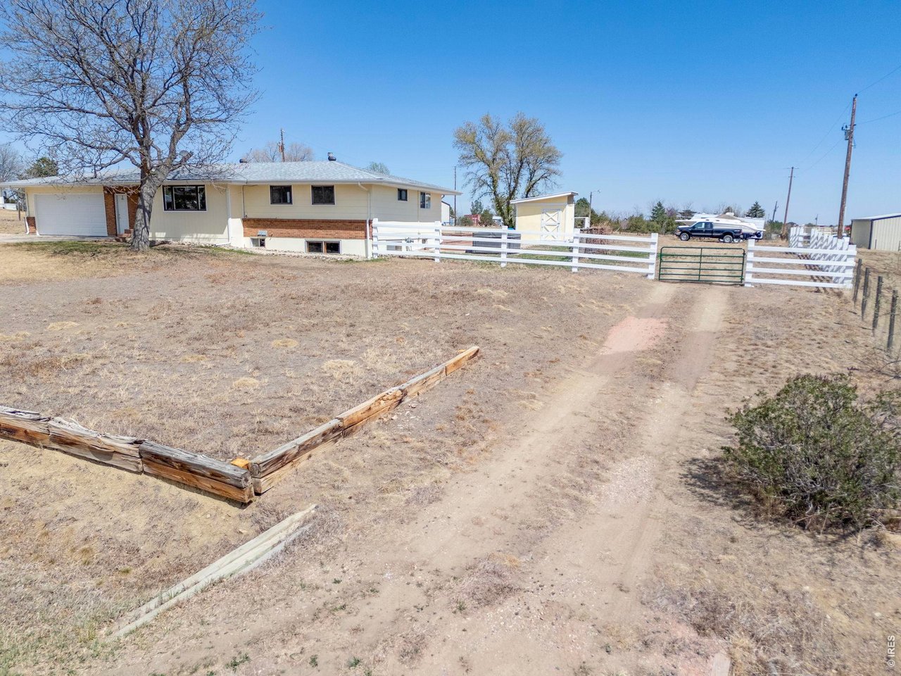 218 Bothun Road Berthoud, CO 80513 - Photo 26 of 35 Side gate for accessing the fenced yard.