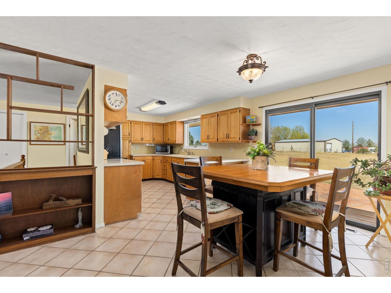 218 Bothun Road Berthoud, CO 80513 - Photo 7 of 35 Dining Room with Slider to the large backyard.
