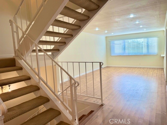 28124 Ridgethorne Court Rancho Palos Verdes, CA 90275 - Photo 17 of 52 Staircase up to bedrooms, and staircase down to garage and Bonus Room (called "Creative Corner" by builders).
