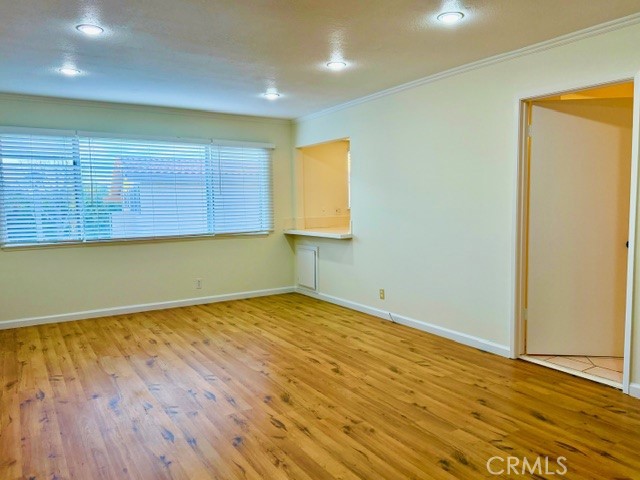 28124 Ridgethorne Court Rancho Palos Verdes, CA 90275 - Photo 20 of 52 Living Room, pass-through to Kitchen, and door leading into Kitchen and Breakfast Room.