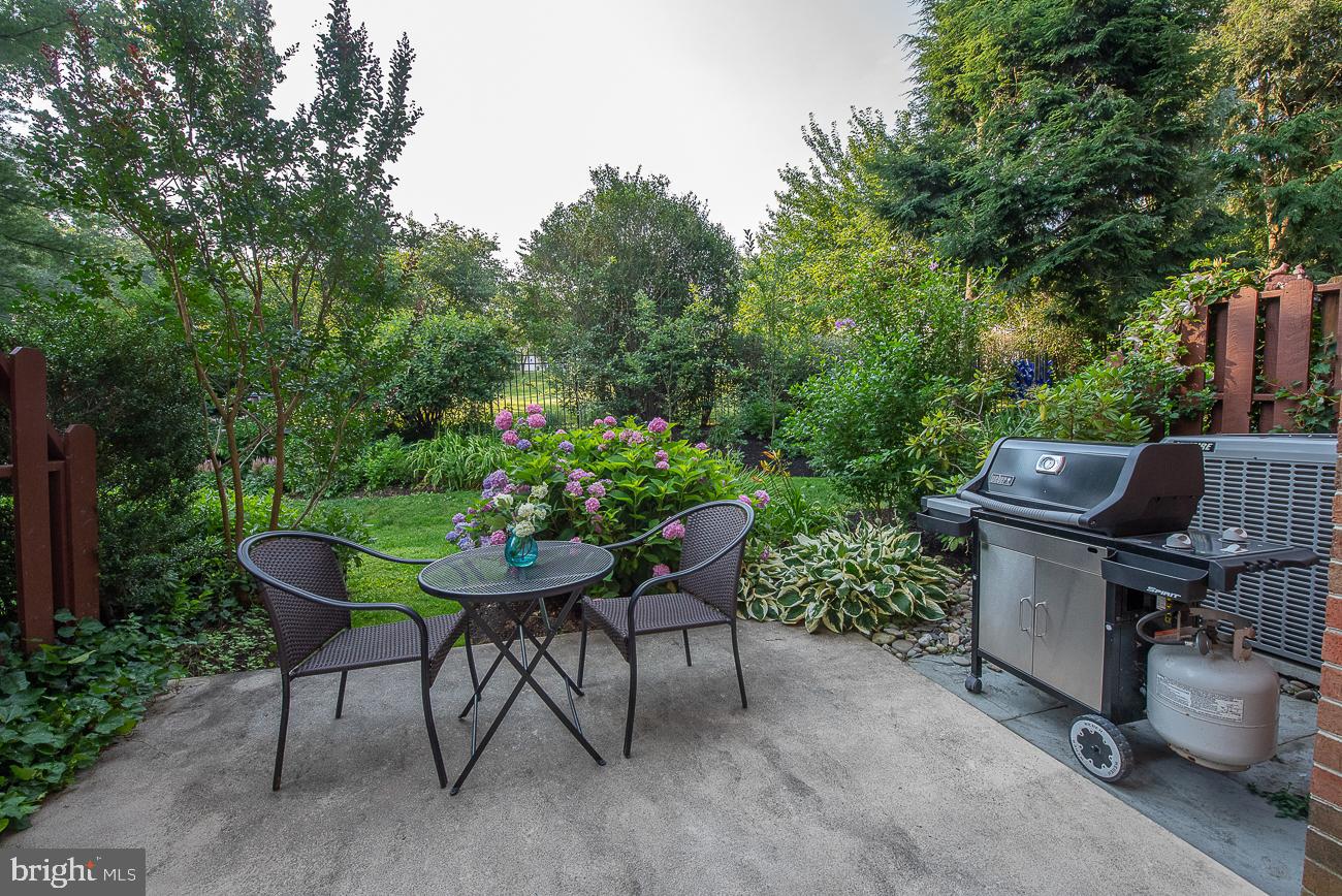 204 Brighton Road Devon, PA 19333 - Photo 28 of 29 Patio in back with lovely plantings