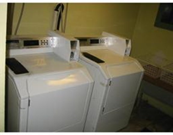 80 Orleans Street, Unit B Boston, MA 02128 - Photo 8 of 9 a utility room with dryer and washer