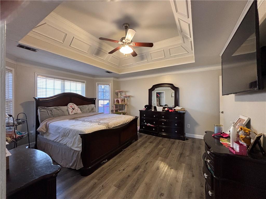 3720 Scotland Lane Southwest Snellville, GA 30039 - Photo 16 of 40 a bedroom with bed window and furniture