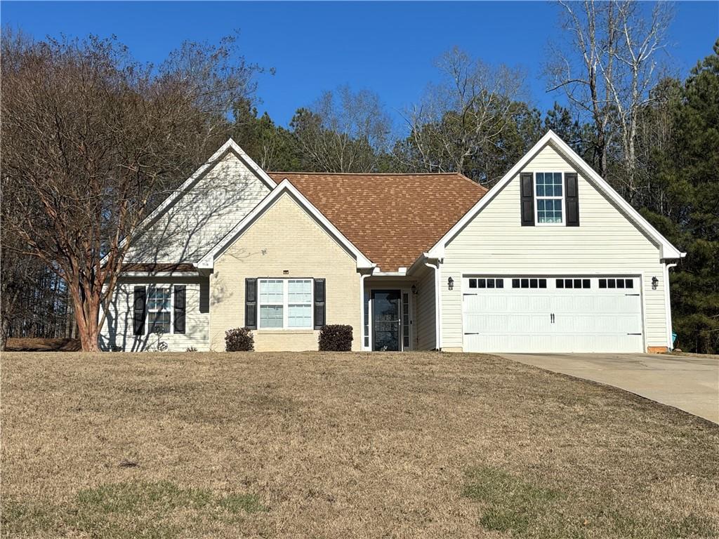 3720 Scotland Lane Southwest Snellville, GA 30039 - Photo 2 of 40 a view of a house with a yard