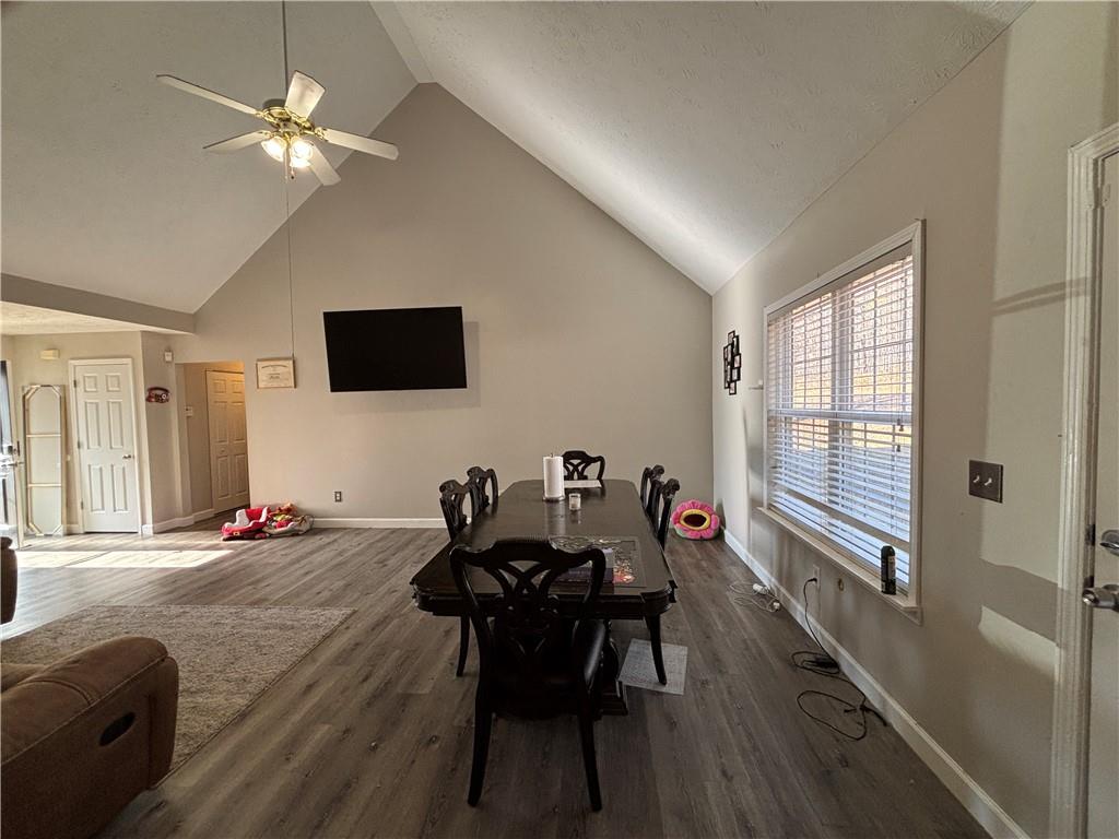 3720 Scotland Lane Southwest Snellville, GA 30039 - Photo 4 of 40 a living room with furniture and a flat screen tv