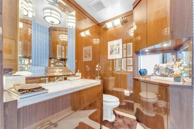 a room with a stove a sink and a refrigerator