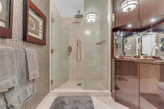 a bathroom with a shower and a sink