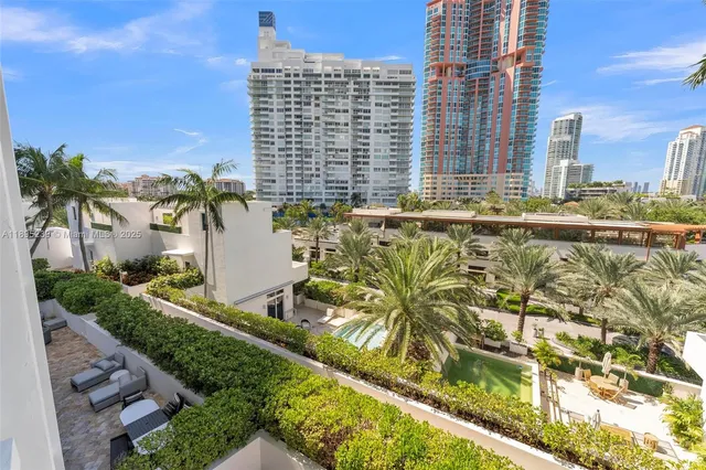 a view of a city with tall buildings