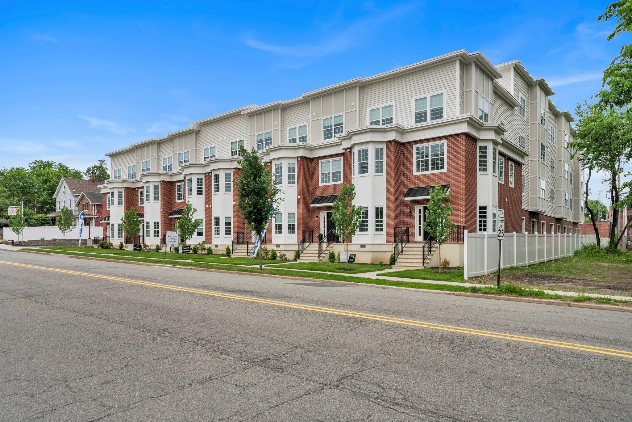70 Ridgedale Avenue, Unit 103 Morristown, NJ 07960 - Photo 1 of 50 a front view of residential houses with street