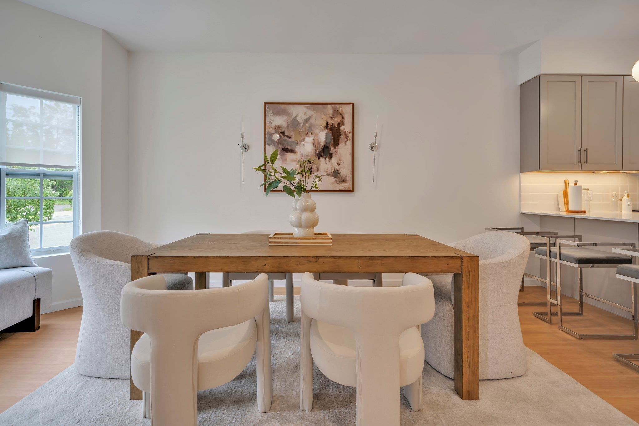 70 Ridgedale Avenue, Unit 103 Morristown, NJ 07960 - Photo 12 of 50 a view of a dining room with furniture and window