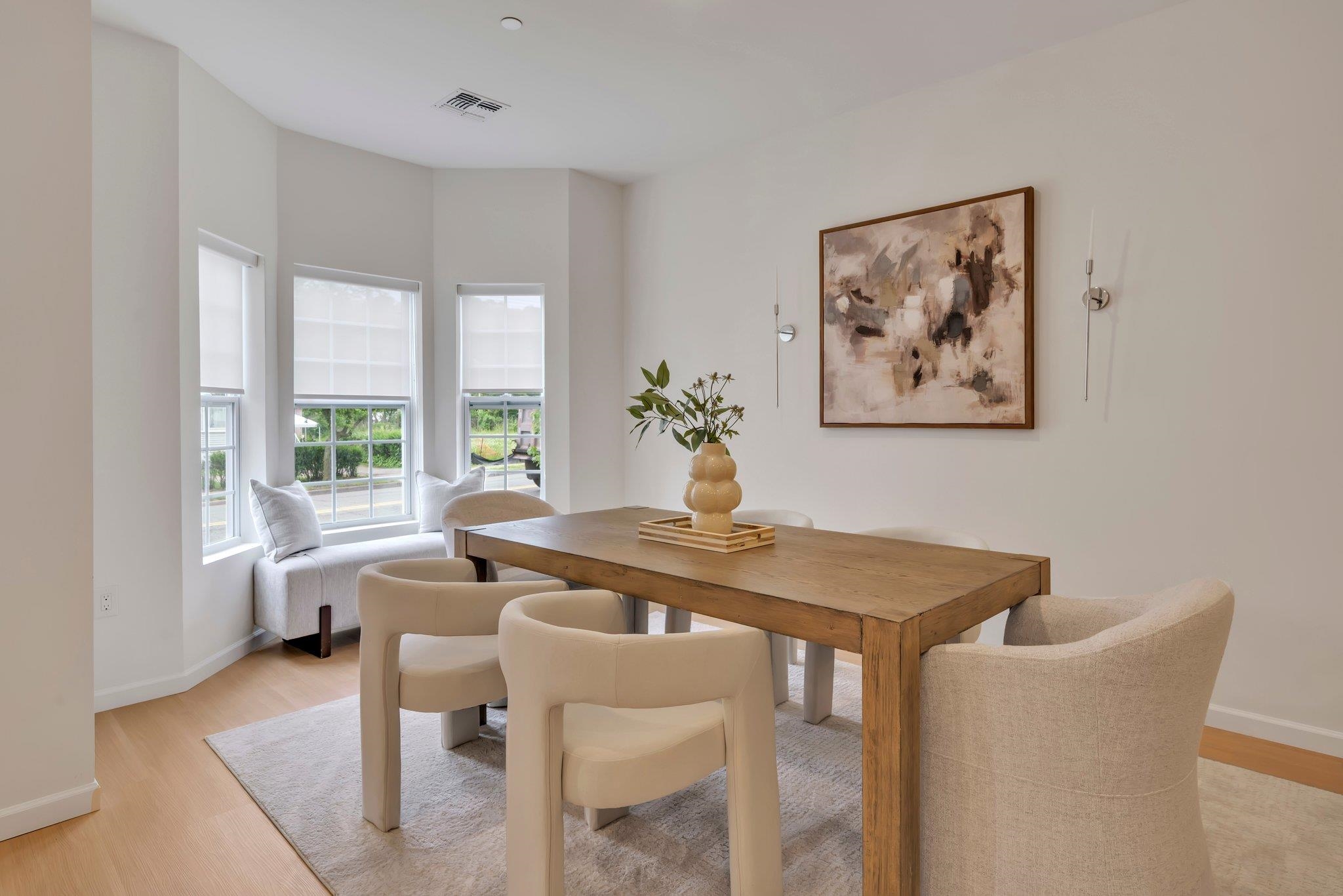 70 Ridgedale Avenue, Unit 103 Morristown, NJ 07960 - Photo 13 of 50 a view of a dining room with furniture window and outside view