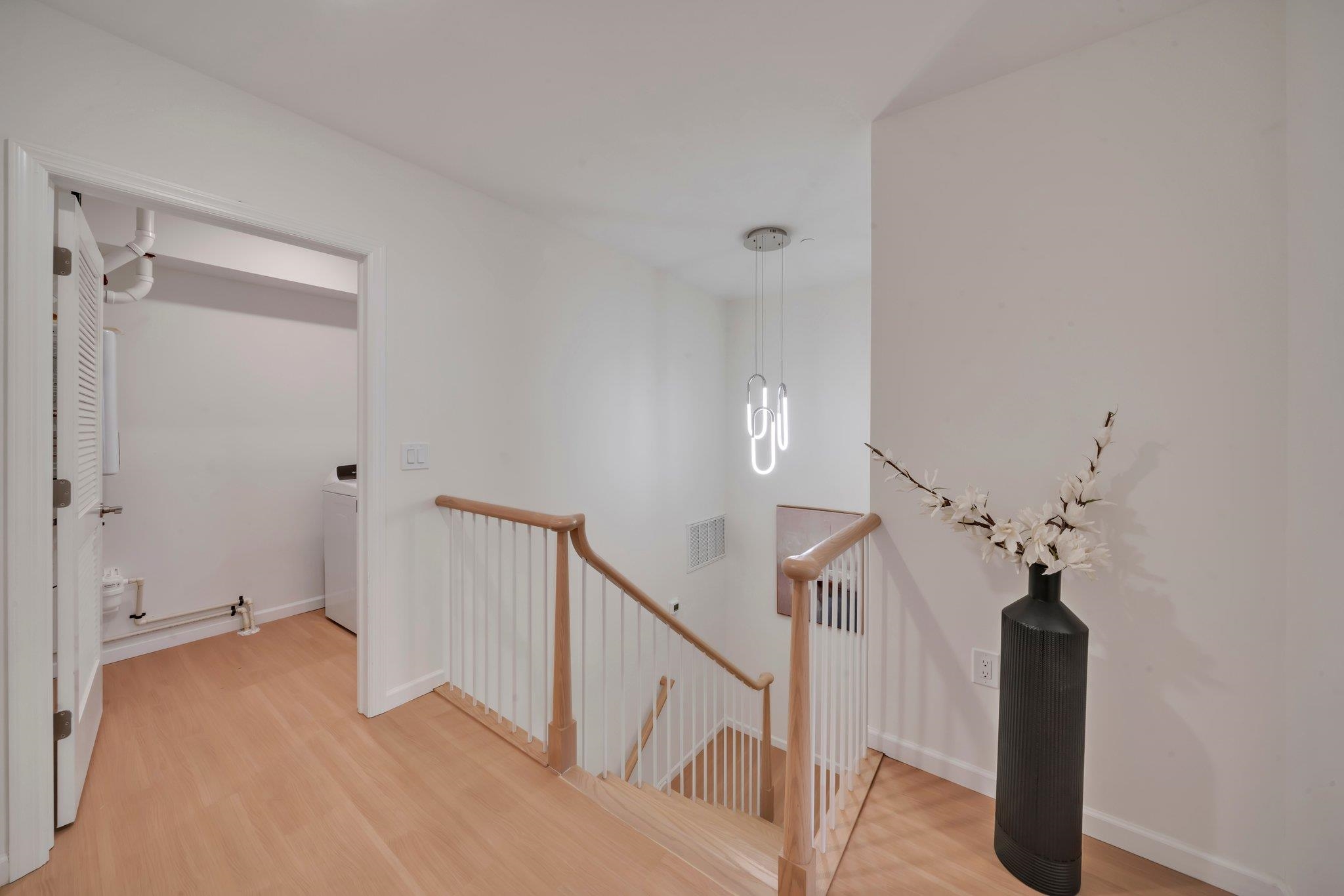 70 Ridgedale Avenue, Unit 103 Morristown, NJ 07960 - Photo 17 of 50 a view of a hallway with closet