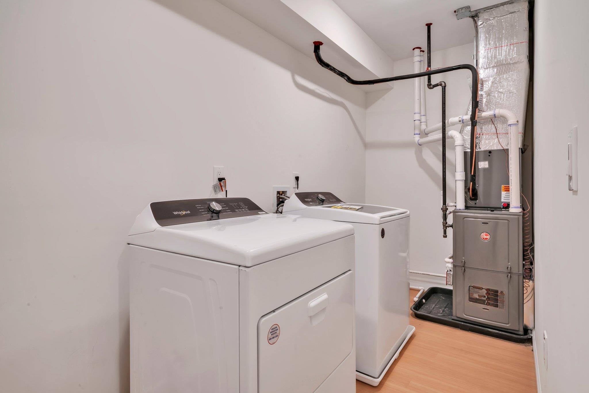 70 Ridgedale Avenue, Unit 103 Morristown, NJ 07960 - Photo 19 of 50 a utility room with dryer and washer