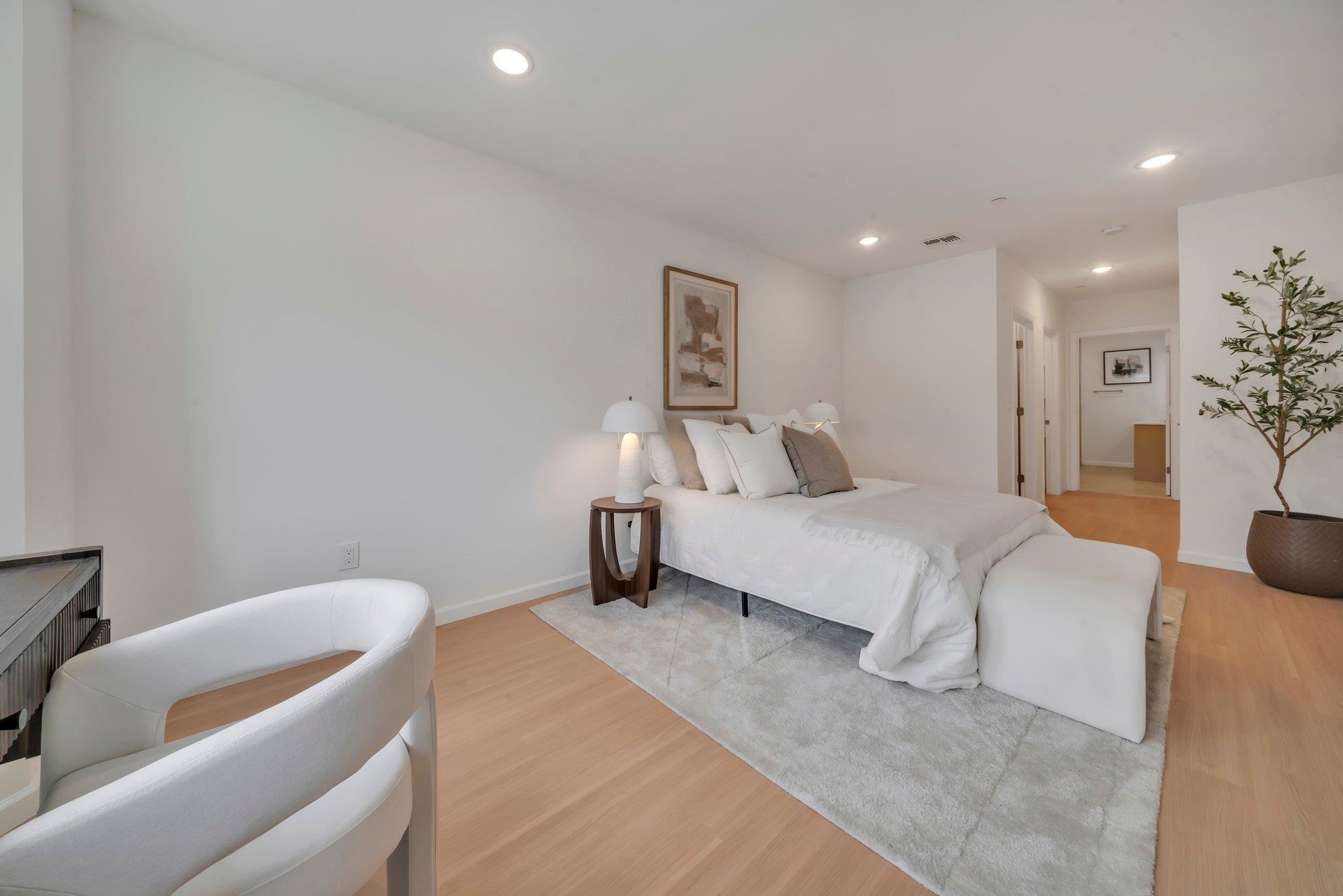 70 Ridgedale Avenue, Unit 103 Morristown, NJ 07960 - Photo 23 of 50 a bedroom with a bed and a couch