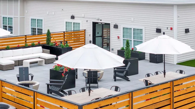 a view of a swimming pool with a yard