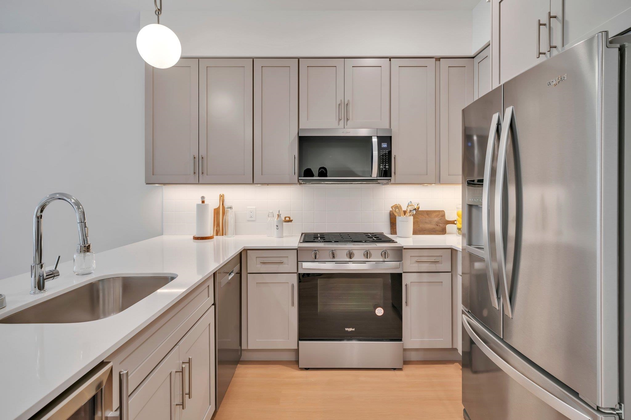 70 Ridgedale Avenue, Unit 103 Morristown, NJ 07960 - Photo 6 of 50 a kitchen with a refrigerator sink and microwave