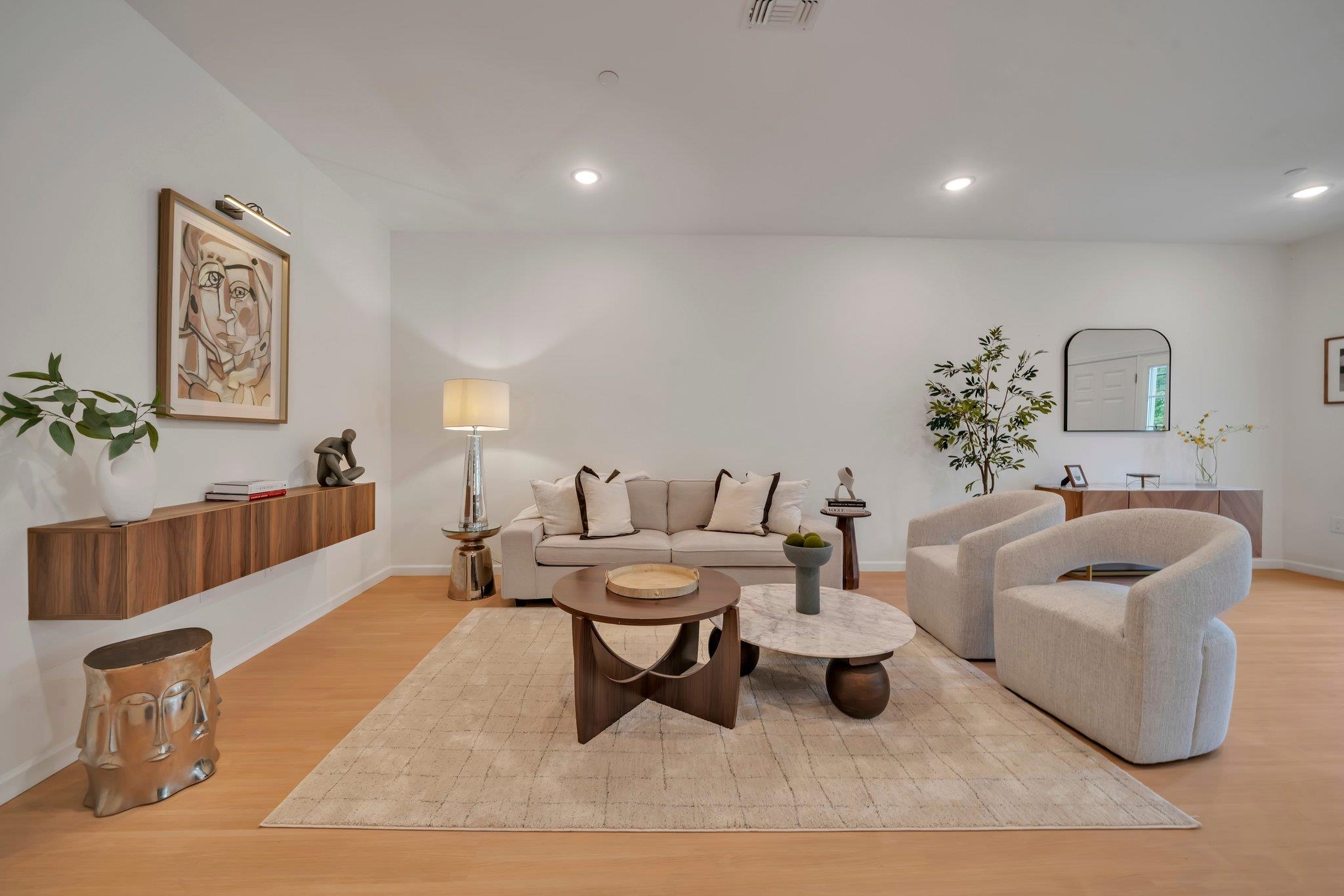 70 Ridgedale Avenue, Unit 103 Morristown, NJ 07960 - Photo 7 of 50 a living room with furniture and rug