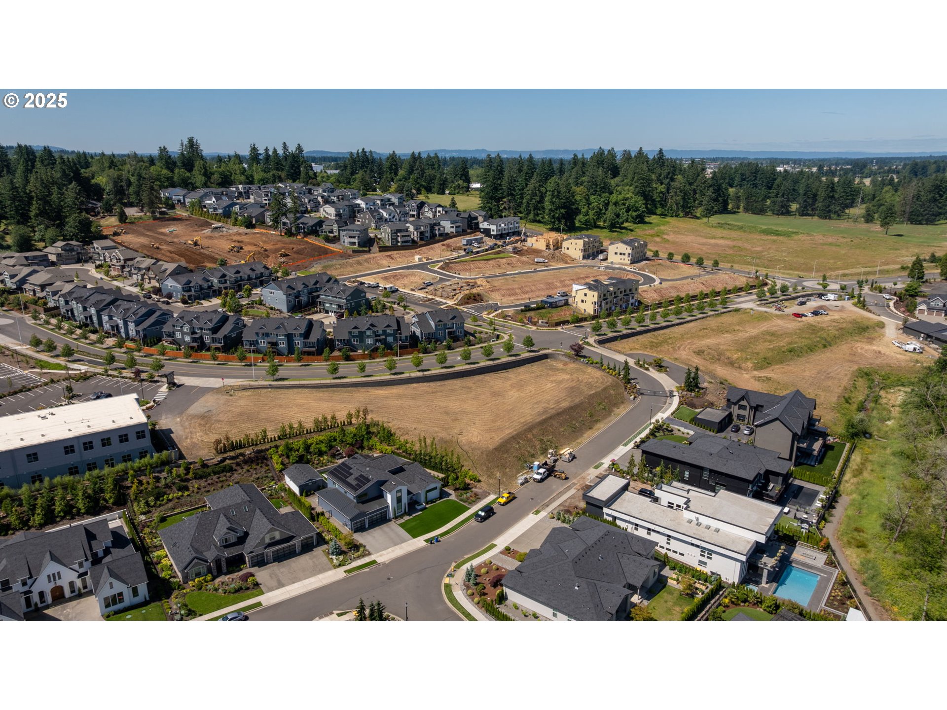 3601 Northwest Camas Meadows Drive Camas, WA 98607 - Photo 8 of 20 an aerial view of a house with a lake view