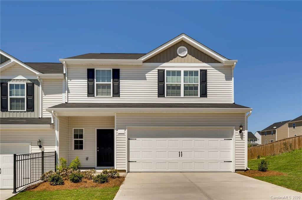 3421 Ellingford Road Charlotte, NC 28214 - Photo 1 of 16 a front view of a house with garden