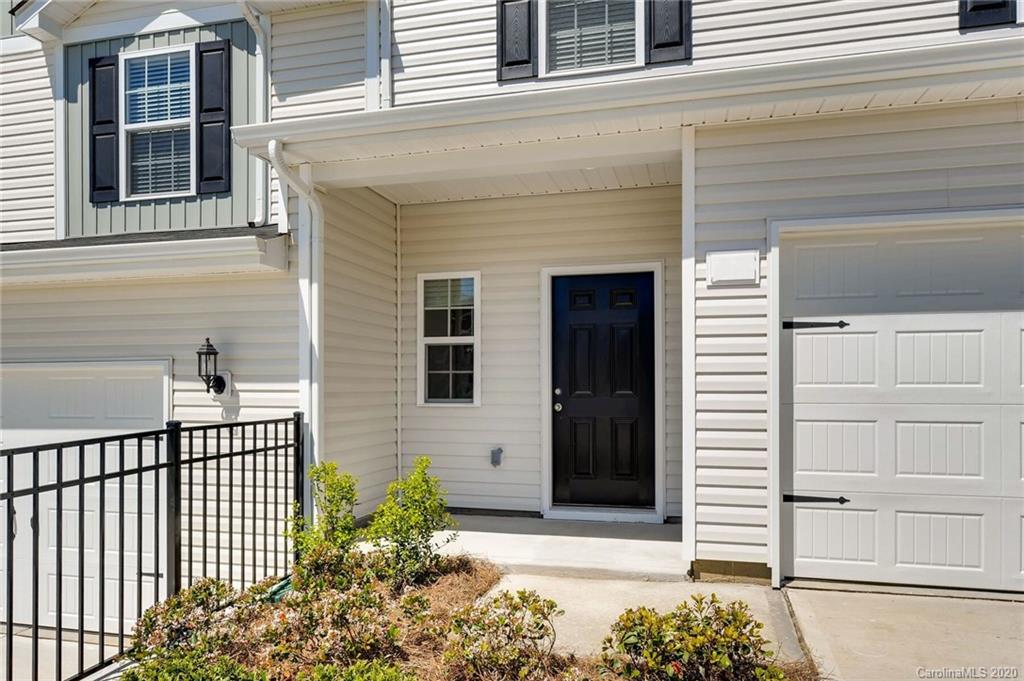 3421 Ellingford Road Charlotte, NC 28214 - Photo 2 of 16 a view of a house with a window and pathway