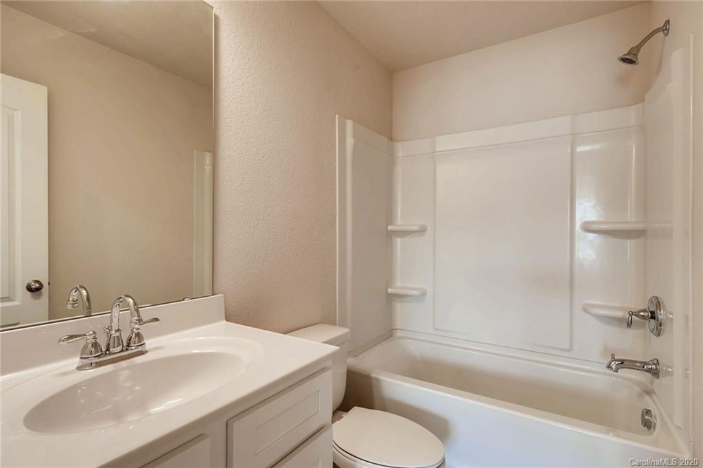 3421 Ellingford Road Charlotte, NC 28214 - Photo 16 of 16 a bathroom with a sink toilet and shower