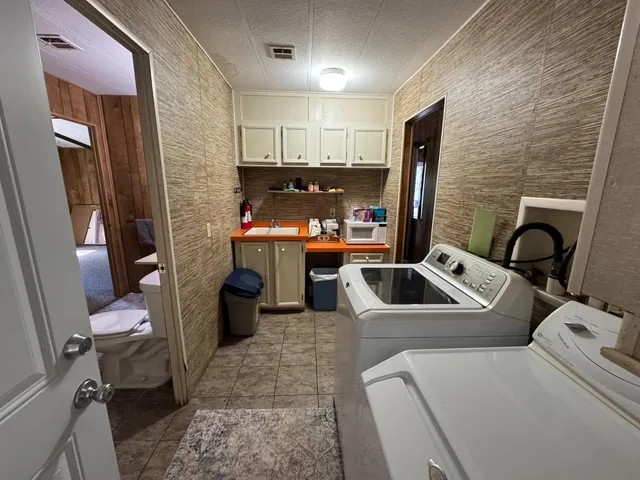 a bathroom with a sink and toilet
