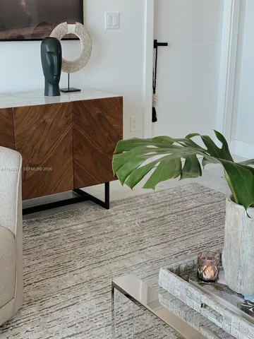 a living room with large windows