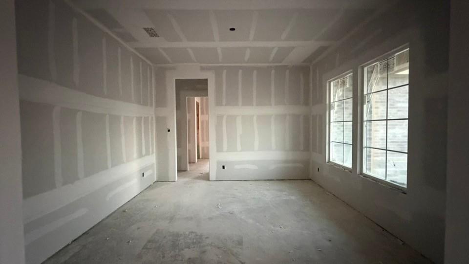 907 Perrin Lane Van Alstyne, TX 75495 - Photo 7 of 7 a view of an empty room with a window