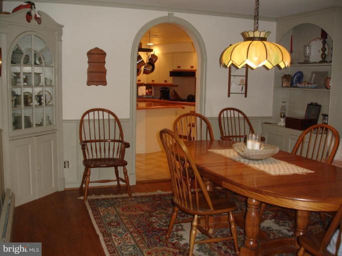 10 Ridge Road Severna Park, MD 21146 - Photo 19 of 23 Corner hutches & wainscotting & arched doorway