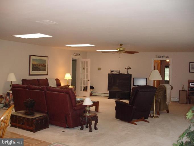 10 Ridge Road Severna Park, MD 21146 - Photo 4 of 23 Wall of sliders and skylights