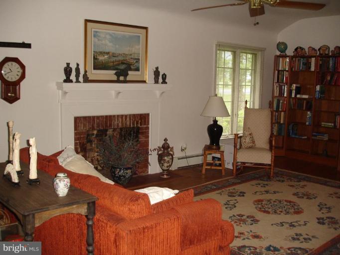 10 Ridge Road Severna Park, MD 21146 - Photo 5 of 23 Classy formal living area w/fp and hardwoods