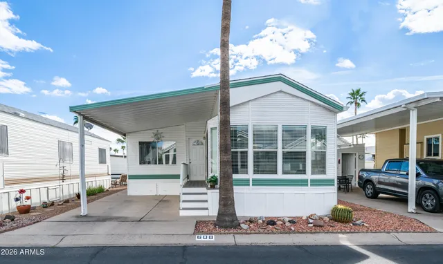 a front view of a house with a garage