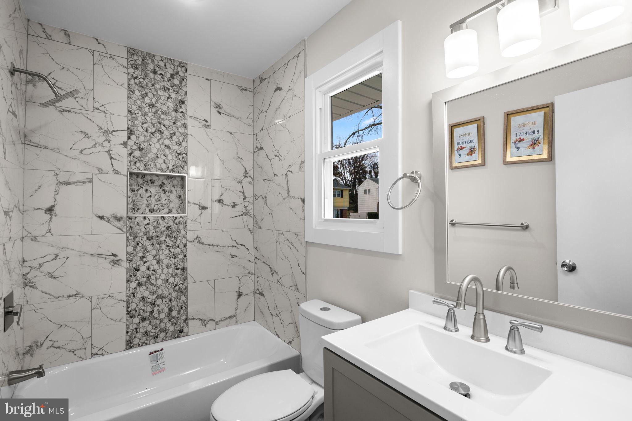 3908 Rayton Road Randallstown, MD 21133 - Photo 20 of 42 a bathroom with a sink toilet and shower