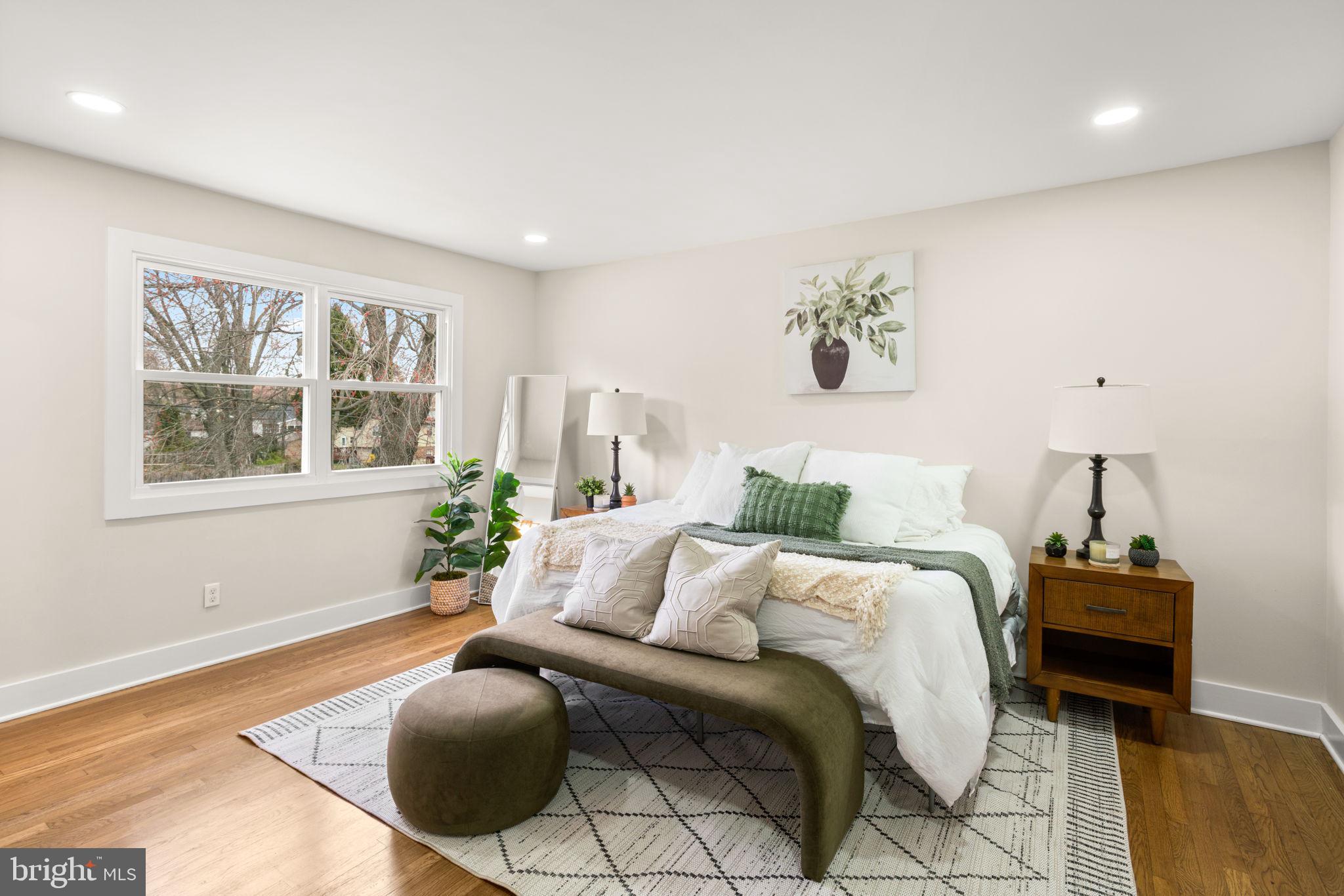 3908 Rayton Road Randallstown, MD 21133 - Photo 22 of 42 a bedroom with bed and window