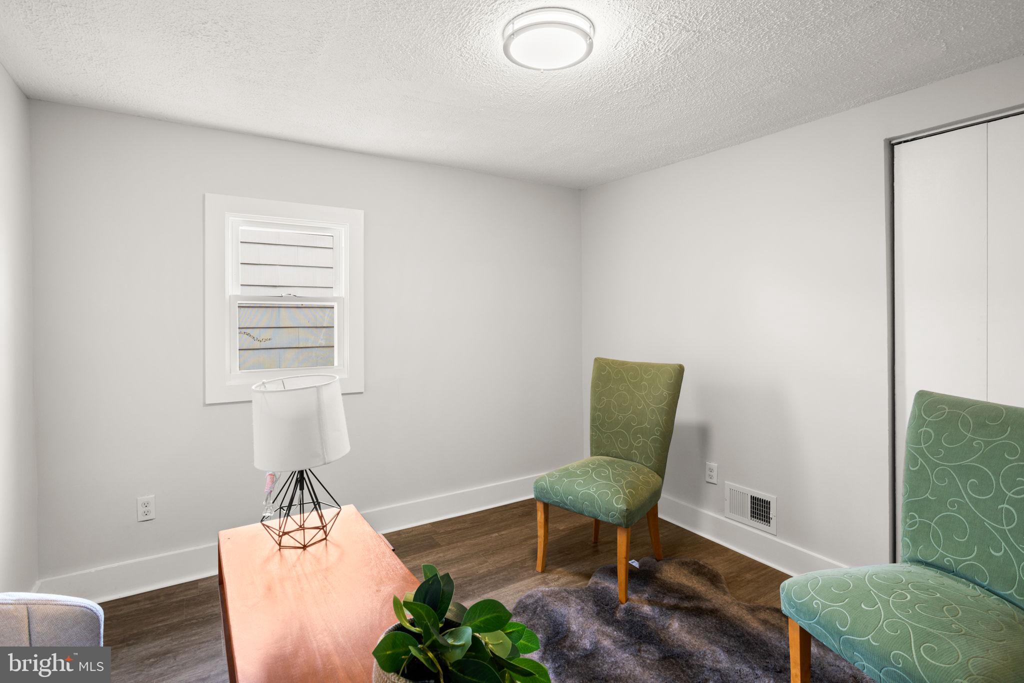 3908 Rayton Road Randallstown, MD 21133 - Photo 27 of 42 a living room with furniture and a window