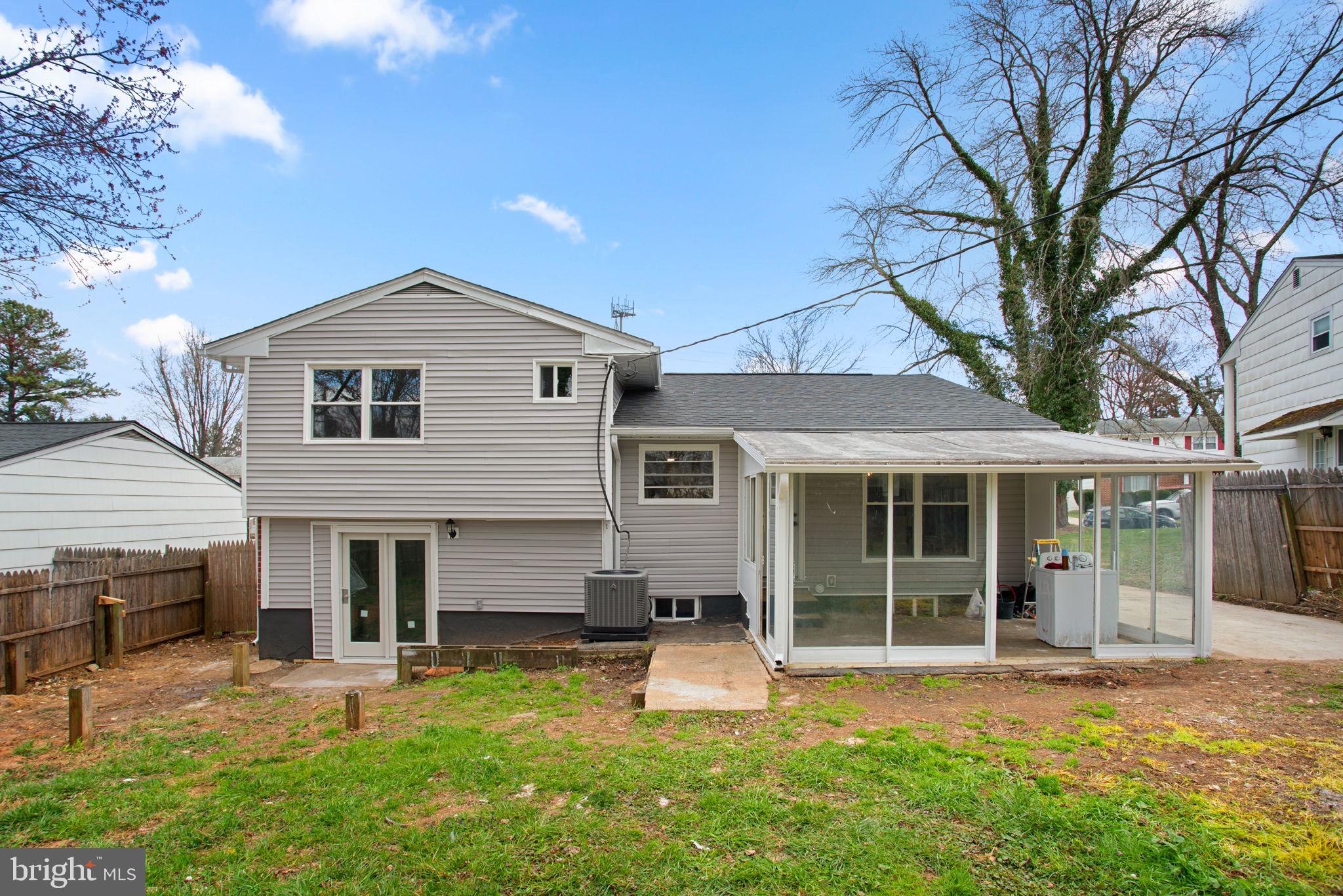 3908 Rayton Road Randallstown, MD 21133 - Photo 39 of 42 a front view of a house with a yard and porch