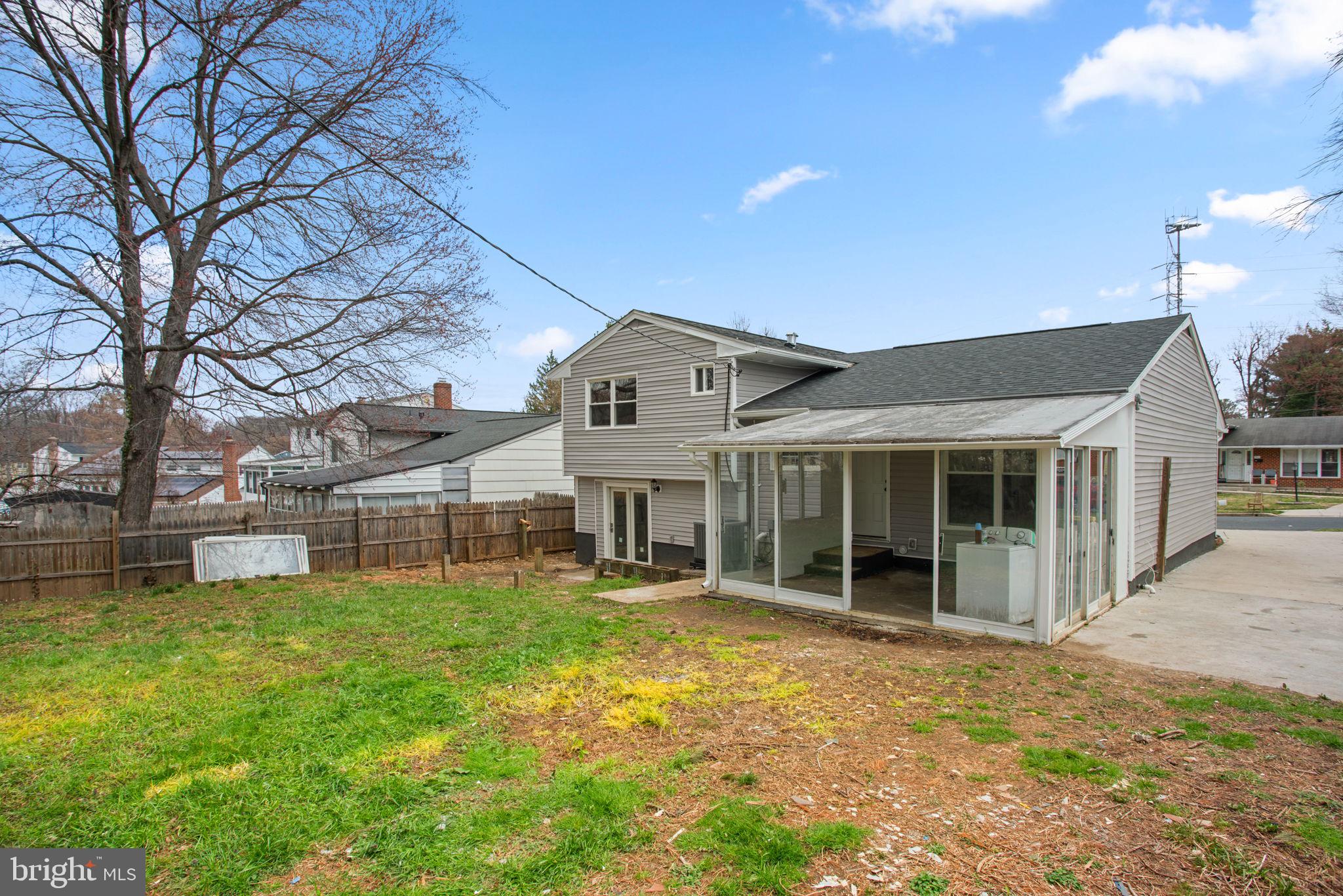 3908 Rayton Road Randallstown, MD 21133 - Photo 41 of 42 a view of a house with a big yard and large tree