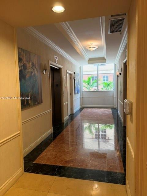 3232 Southwest 22nd Terrace, Unit 1303 Miami, FL 33145 - Photo 35 of 43 Entering Elevator Hallway at Lobby
