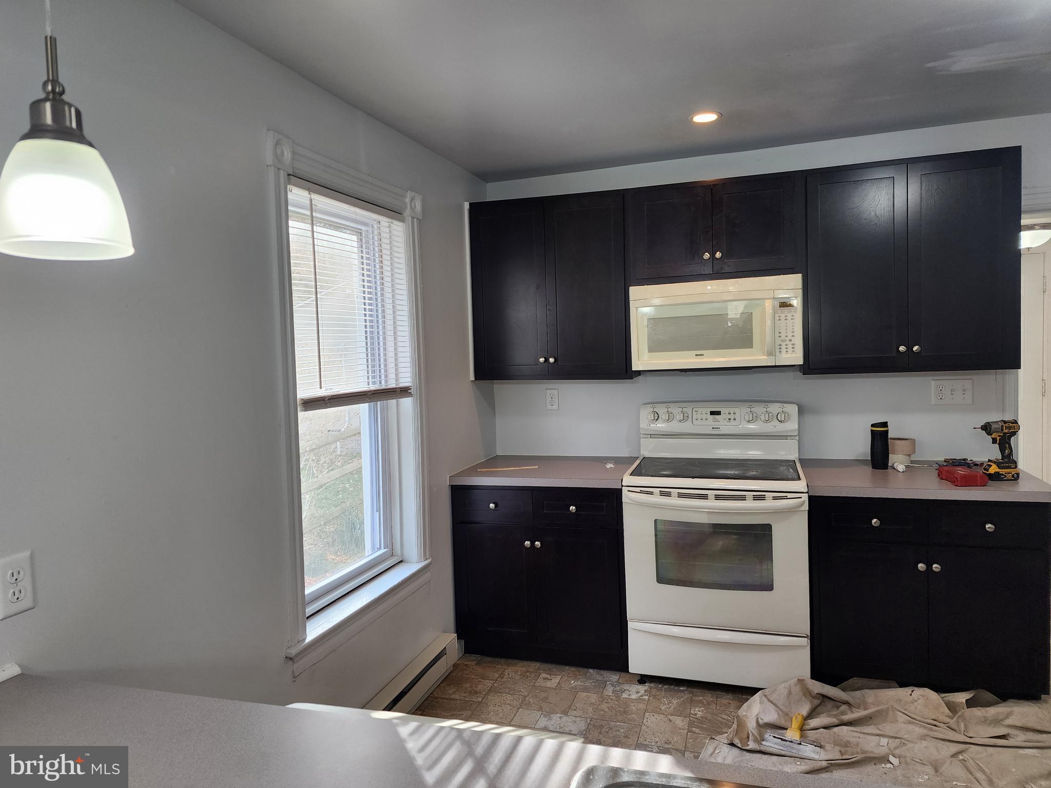119 North Brandywine Avenue Modena, PA 19320 - Photo 4 of 13 a kitchen with a stove and a refrigerator