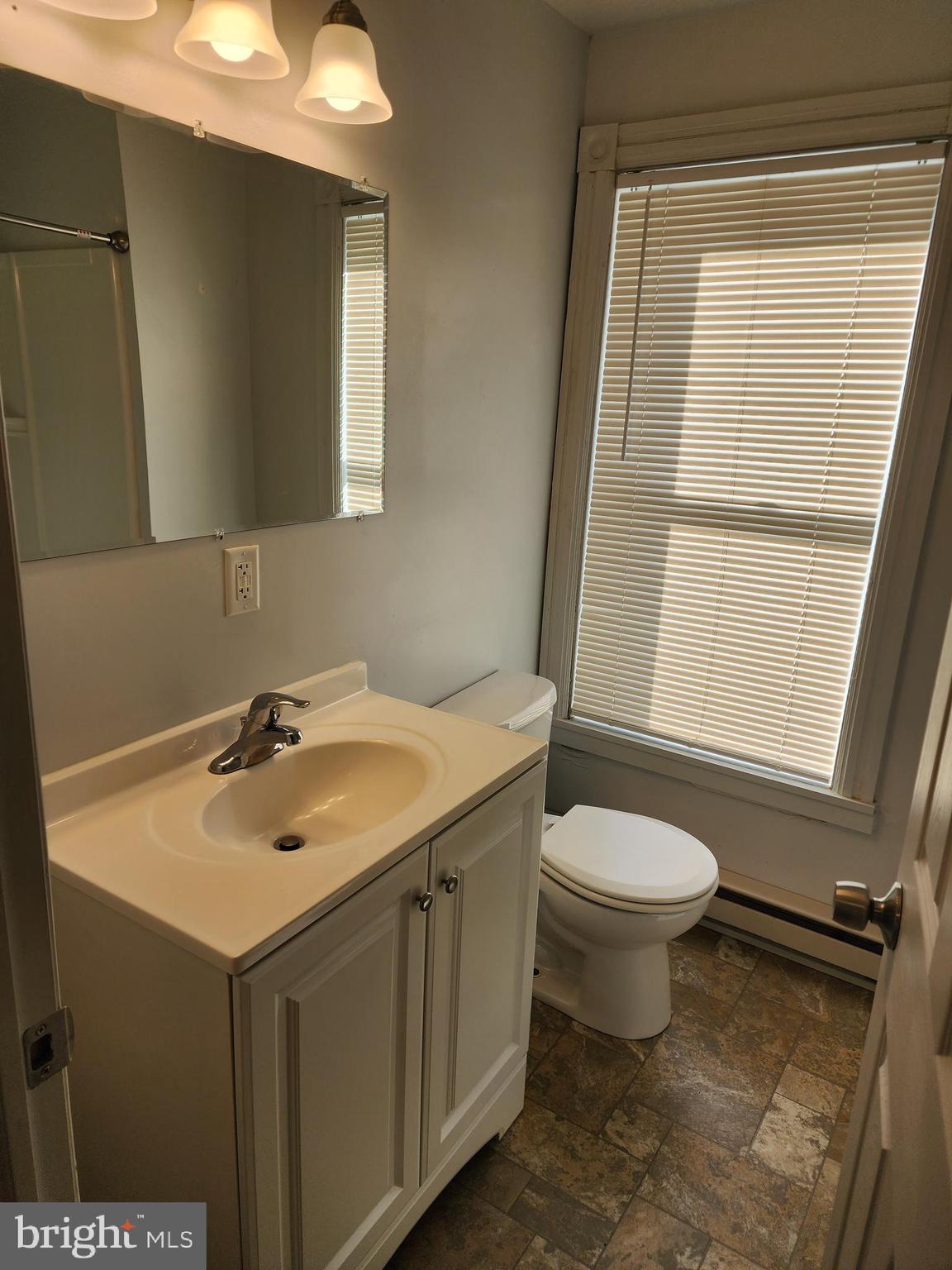 119 North Brandywine Avenue Modena, PA 19320 - Photo 10 of 13 a bathroom with a sink and a toilet