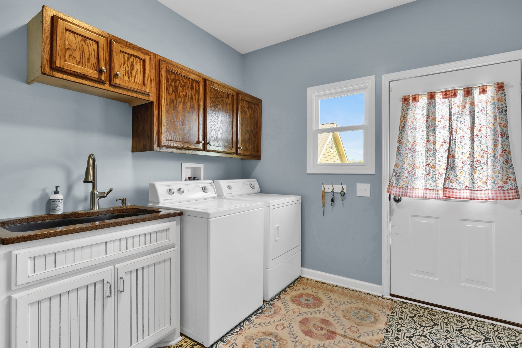 3988 Fykes Grove Road Cedar Hill, TN 37032 - Photo 34 of 50 a kitchen that has a sink and a stove
