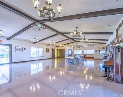 2240 Golden Oak Lane, Unit 132 Merced, CA 95341 - Photo 12 of 13 a view of a room with lots of dining room and chandelier