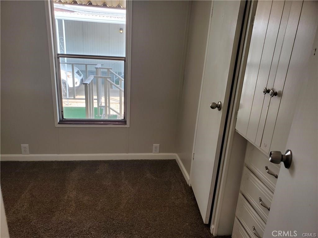 2240 Golden Oak Lane, Unit 132 Merced, CA 95341 - Photo 8 of 13 an empty room with windows