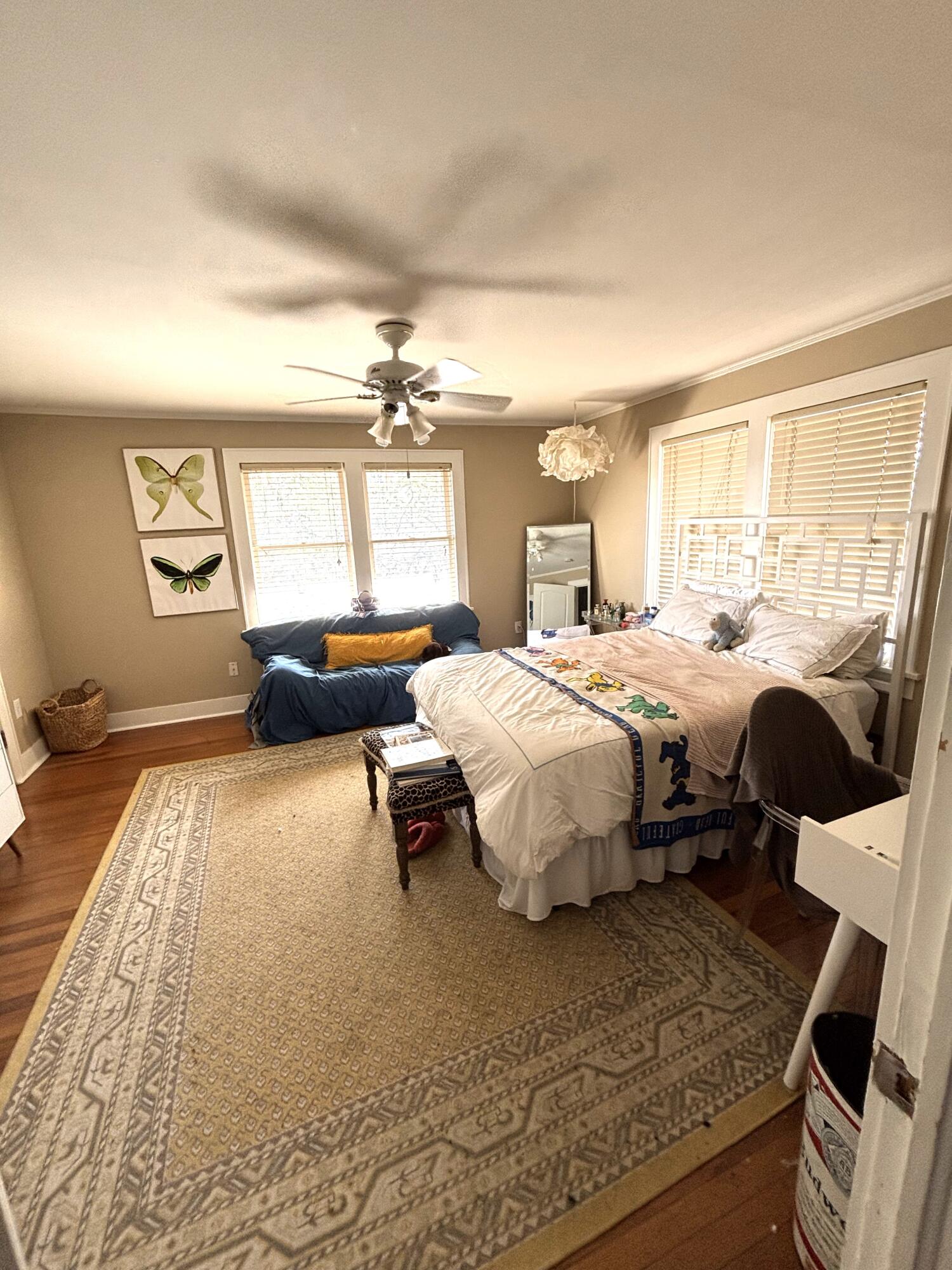 2315 16th Street Lubbock, TX 79401 - Photo 13 of 20 a bedroom with a bed couch and window