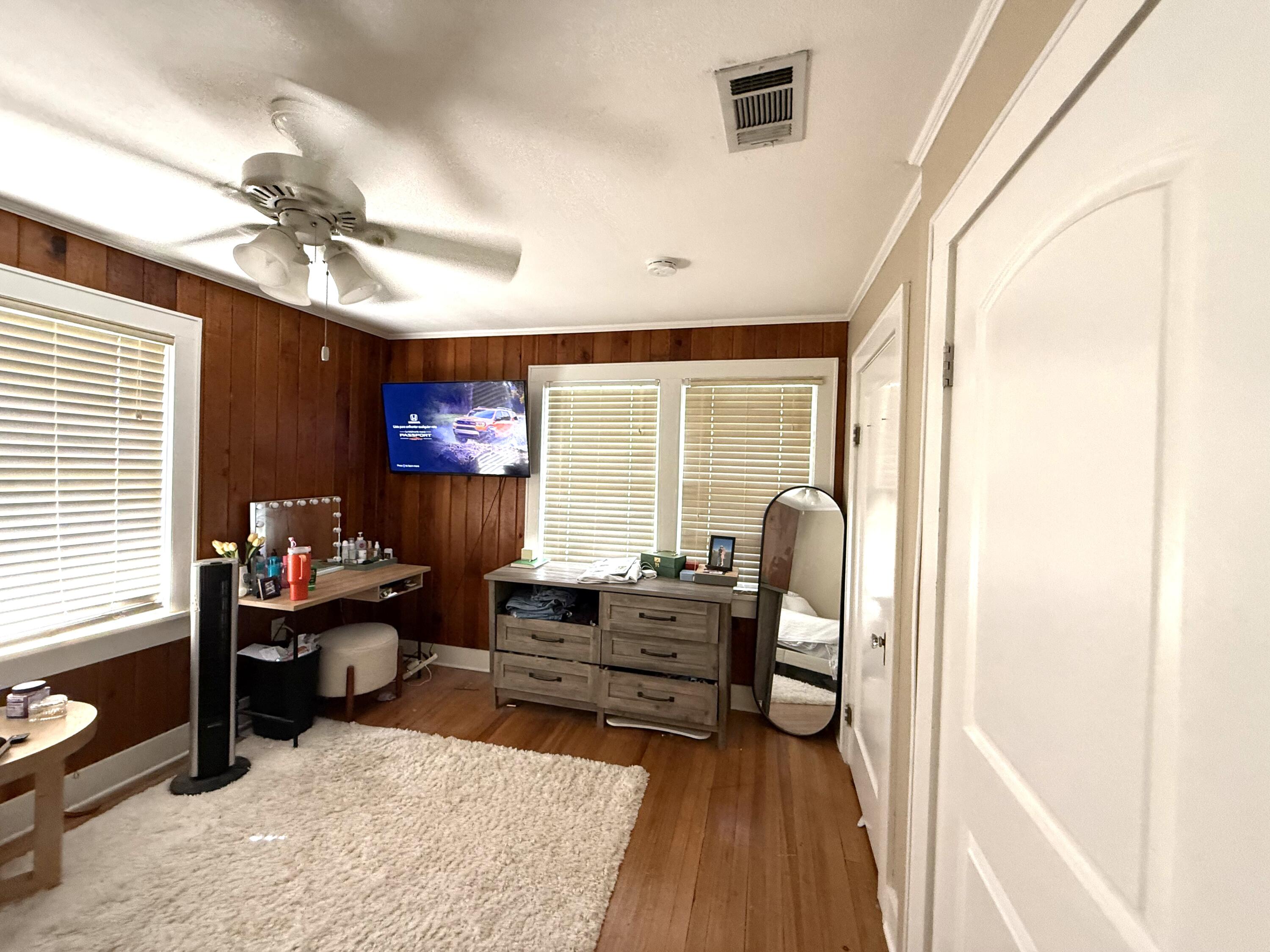 2315 16th Street Lubbock, TX 79401 - Photo 3 of 20 a living room with furniture and a window