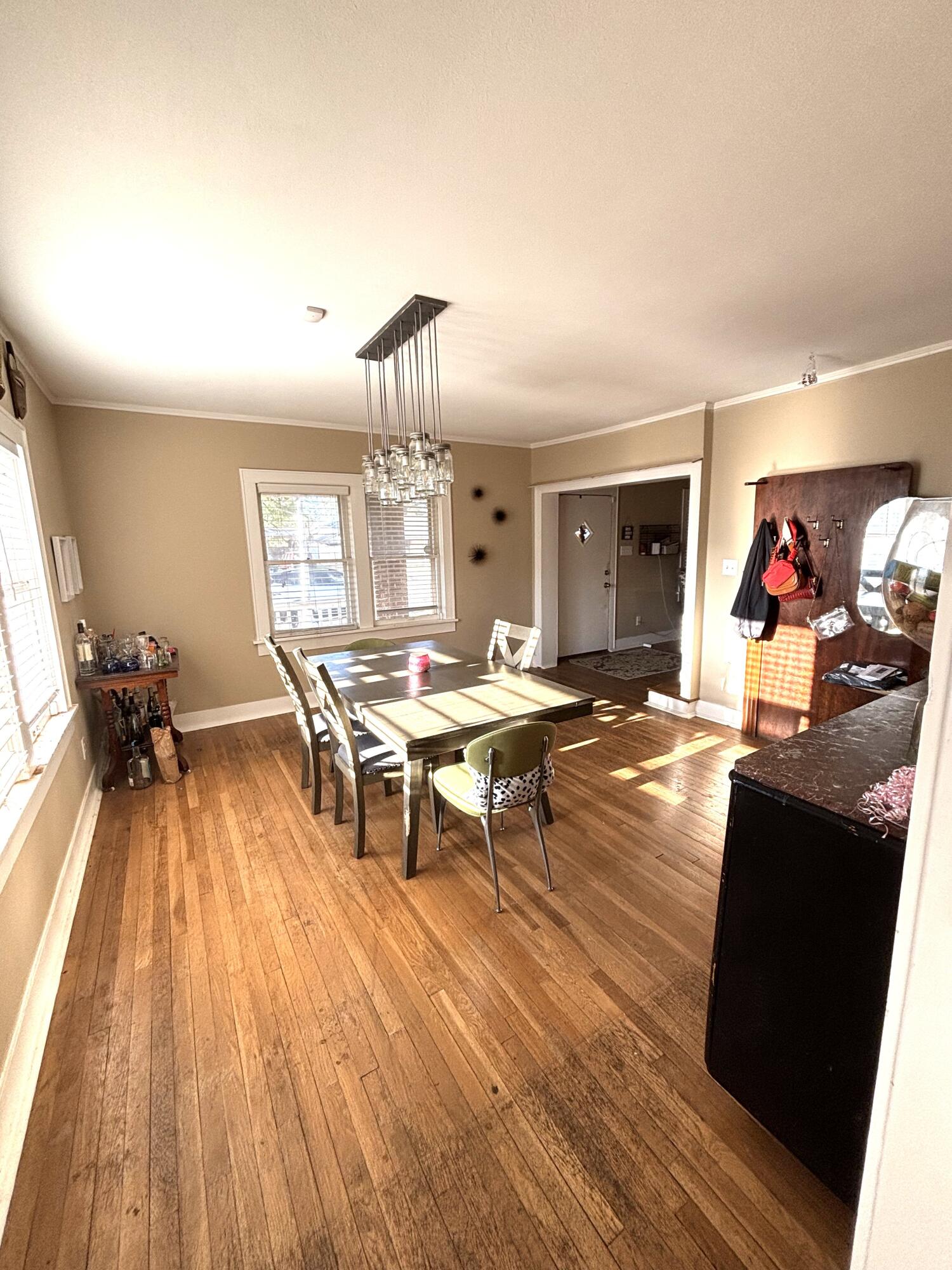 2315 16th Street Lubbock, TX 79401 - Photo 9 of 20 a living room with dining room and wooden floor