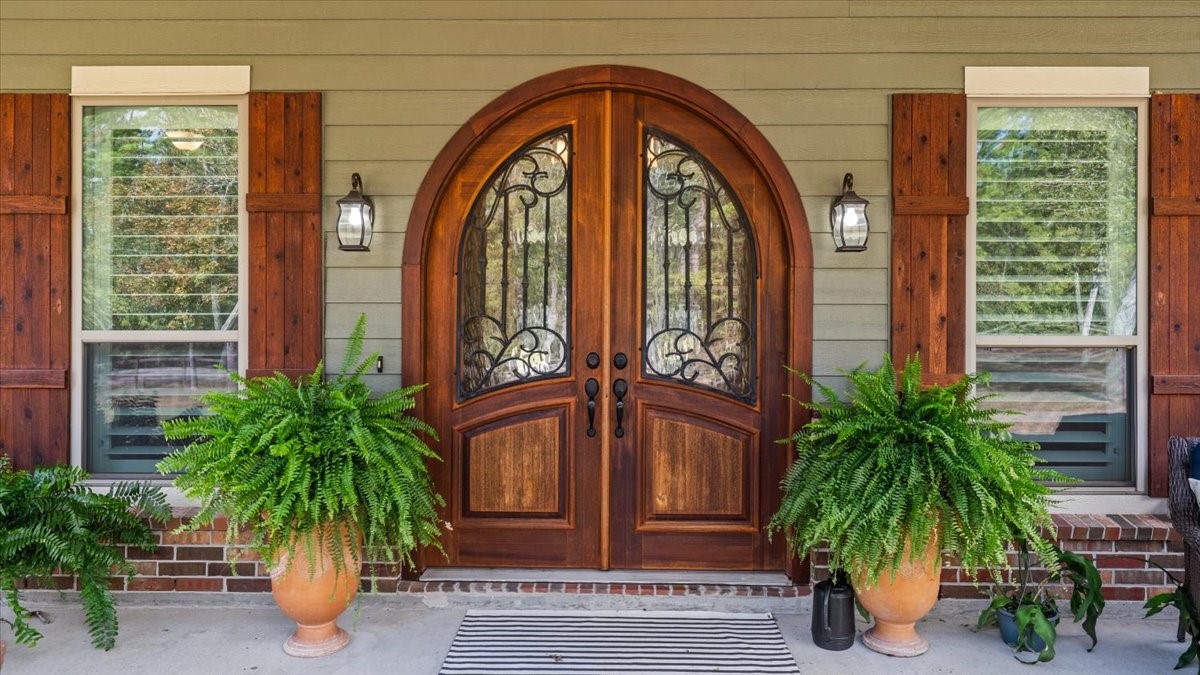 27785 Log Cabin Road Montgomery, TX 77356 - Photo 11 of 50 a front view of a house with garden