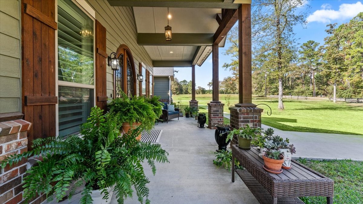 27785 Log Cabin Road Montgomery, TX 77356 - Photo 12 of 50 a garden view with a seating space