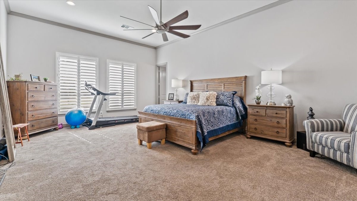 27785 Log Cabin Road Montgomery, TX 77356 - Photo 31 of 50 a bedroom with furniture and a bed